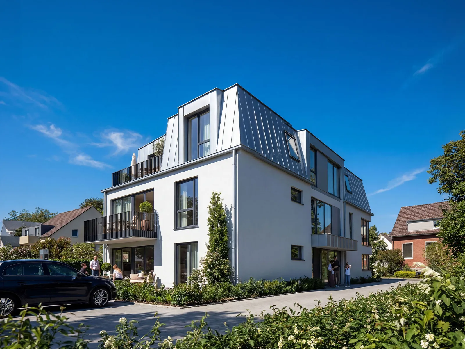 Außenvisualisierung eines modernen Mehrfamilienhauses mit Zinkdach